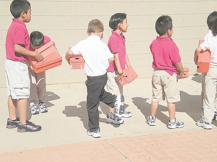 Aguilar Elementary students get new shoes